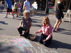 MG Trainees Peg Burman and Judy Reich enjoying some sidewalk chalk action (photo by MG W. Miller)